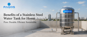 Paqos stainless steel water tank installed on a rooftop with metal outlet pipes for safe and hygienic home water storage.