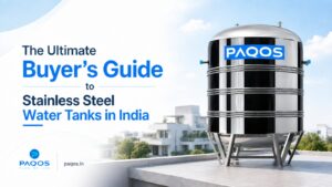 PAQOS stainless steel water tank installed on a modern rooftop with the text “The Ultimate Buyer’s Guide to Stainless Steel Water Tanks in India.